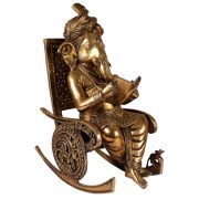 Ganpati reading on chair